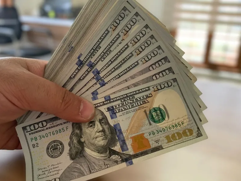 qual a projeção do dólar para 2025